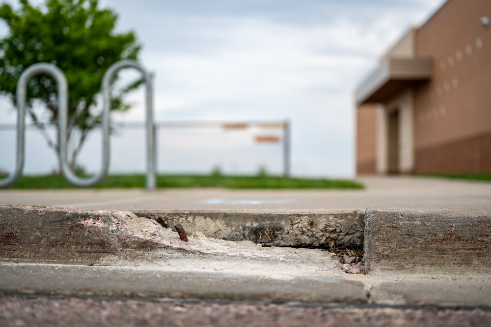 how to fix a sidewalk trip hazard